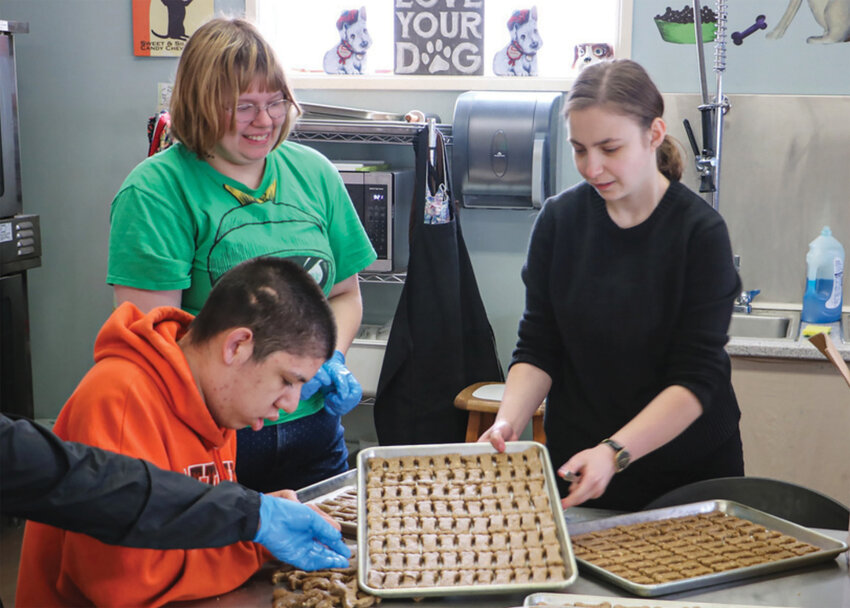 Battle Ground Public Schools students in the Futures Transition Program learn life skills while baking dog treats for the Battle Ground Barkery.