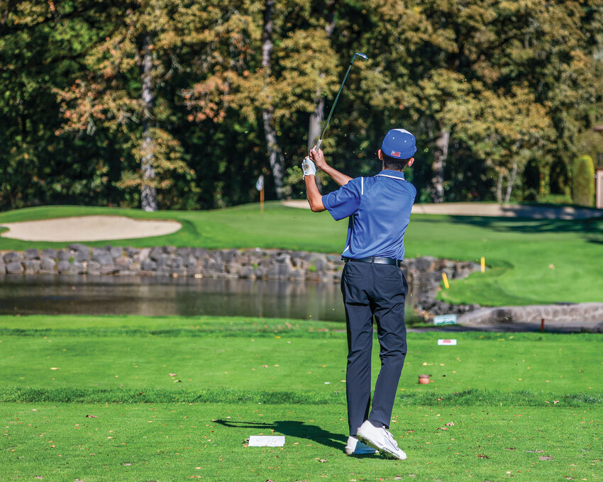 La Center&rsquo;s Blake Stephens watches his tee shot at Royal Oaks Country Club during the Clark County Cup high school golf tournament on Monday, Oct. 6.