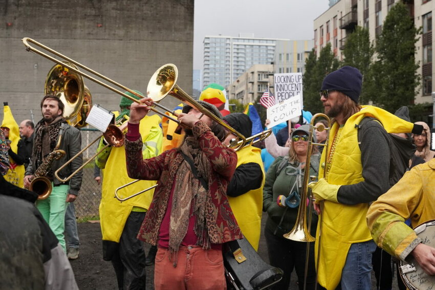 A band plays at a protests at the Immigration and Customs Enforcement facility south of downtown Portland on Sunday, Oct. 12, 2025.