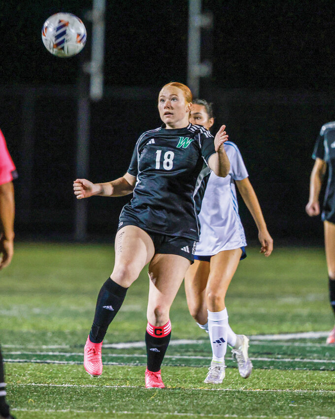 Woodland senior Shaylee Thayer watches the ball come to her during the Beavers&rsquo; 2-1 win over the Hockinson Hawks on Tuesday, Oct. 14.