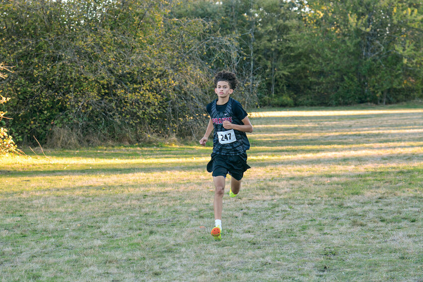 Prairie sophomore D&rsquo;Argo Heid runs the final stretch of the 5K during Tuesday&rsquo;s meet at Pacific Community Park in Vancouver. The Prairie boys took first overall, continuing their undefeated season.