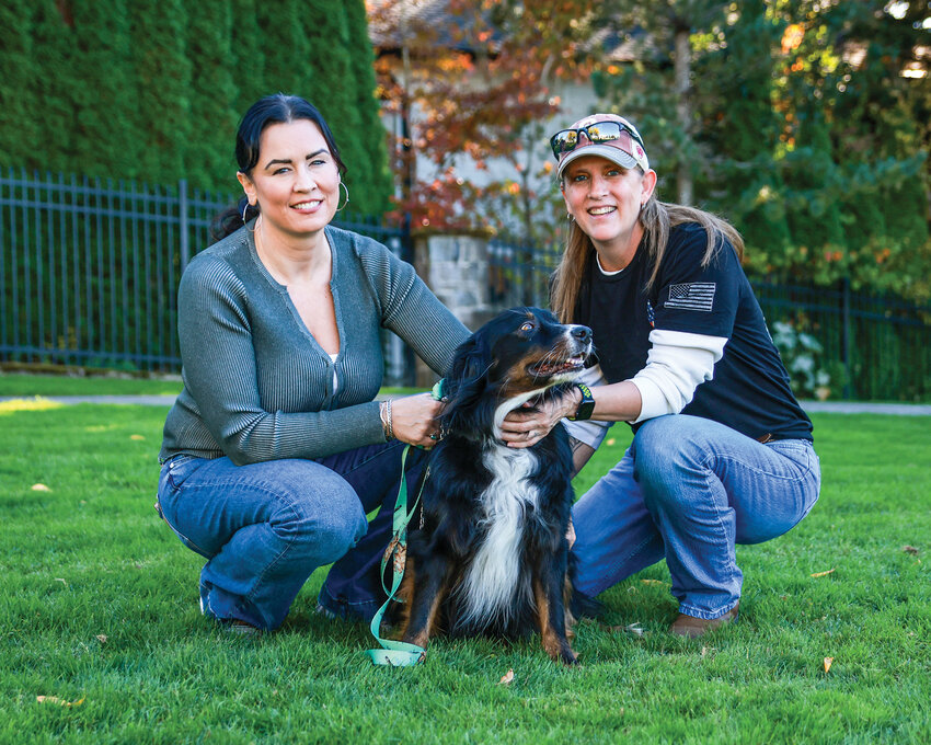 Pepper the dog is overjoyed, and so is owner Meika Pechin, left, after Jenn Maphet, right, with the help of friend Elin Allen during a horseback ride found and returned Pepper to Pechin after she had been missing for seven days in the La Center Bottoms area along the East Fork Lewis River on Friday, Oct. 10.