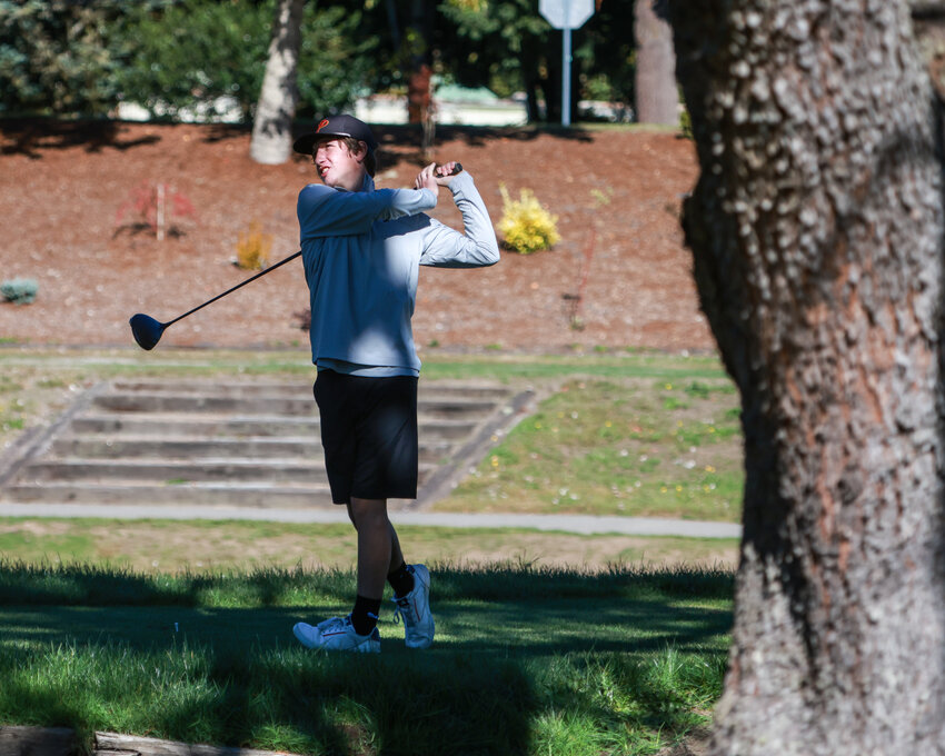 Prairie&rsquo;s Alex Vockler watches his tee shot on hole 9 at the Lewis River Golf Course in Woodland during the 3A District Golf Tournament on Tuesday, Oct. 14. Vockler qualified for the bi-district tournament alongside teammate Ryken Nlasz.