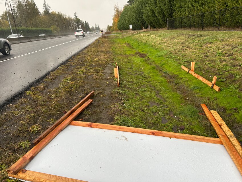 A campaign sign belonging to Charter Review Commission District 5, Position 3 candidate Randi Knott lies destroyed along the state Route 502 corridor on Oct. 25. Knott filed a complaint with the Clark County Sheriff&rsquo;s Office following the incident, which also involved a nearby Clark County Democrats sign promoting affordable housing. Battle Ground School District No. 119, District 1candidate Jennifer Heine-Withee, whose sign was not damaged, said she had previously contacted the Democratic Party to complain about her sign being blocked but denied any involvement in the vandalism.