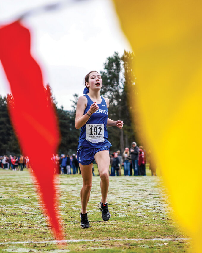 La Center junior runner Sasha Pash crosses the finish line in first place during the 1A District IV cross country championships at Lewis River Golf Course on Thursday, Oct. 30. The La Center girls team earned the team title with five runners in the top 20.