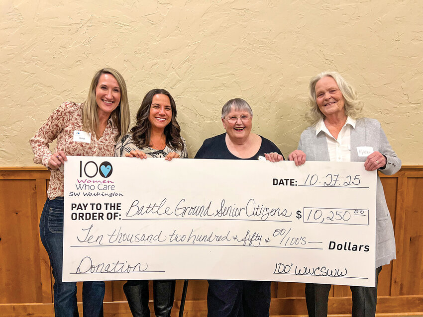 From left, Brook Trang, founding member of the 100 Women Who Care Southwest Washington chapter, Lori Lindberg, Sharon Wodtke and Marsha Gregor hold a check for $10,250 at Windy Hill Winery in Ridgefield on Monday, Oct. 27. The donation, awarded by the 100 Women Who Care SW WA group, will support Battle Ground Senior Citizens Inc. programs serving local seniors.