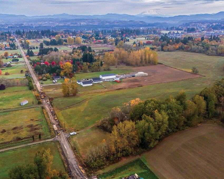 Northeast 92nd Avenue in Battle Ground is seen closed to thru-traffic as construction occurs. Several high-density housing projects are proposed along the current rural road.