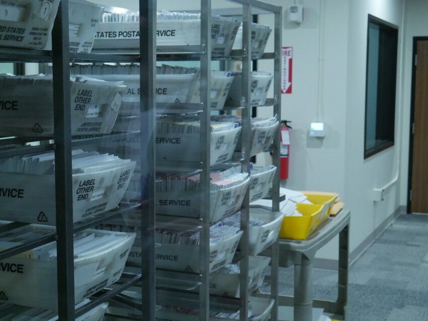 Baskets of ballots sit at Thurston County&rsquo;s new ballot processing center on Thursday. (Photo by Jake Goldstein-Street/Washington State Standard)