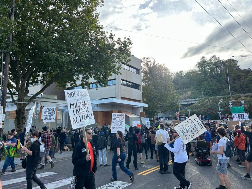 About 200 people showed up to protest outside the Immigration and Customs Enforcement building in Portland on Sunday, Sept. 28. A federal judge ruled Friday that the protests do not qualify as a rebellion or impede federal law enforcement, and that President Donald Trump cannot legally send National Guard troops to federal buildings in the city in light of the mostly peaceful protests. (Photo by Alex Baumhardt/Oregon Capital Chronicle)