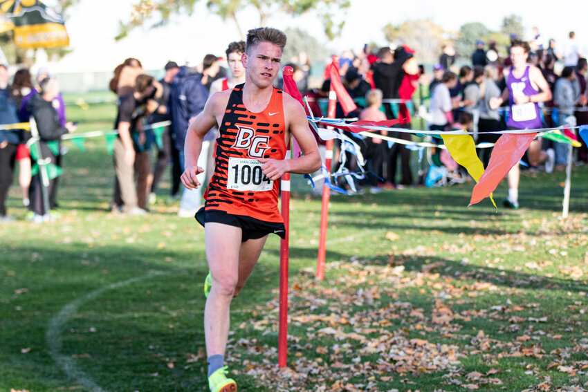 Battle Ground's Trae Cooper runs towards the first mile mark during the Class 4A boys state cross country championships at Sun Willows Golf Course in Pasco on Saturday, Nov. 8.