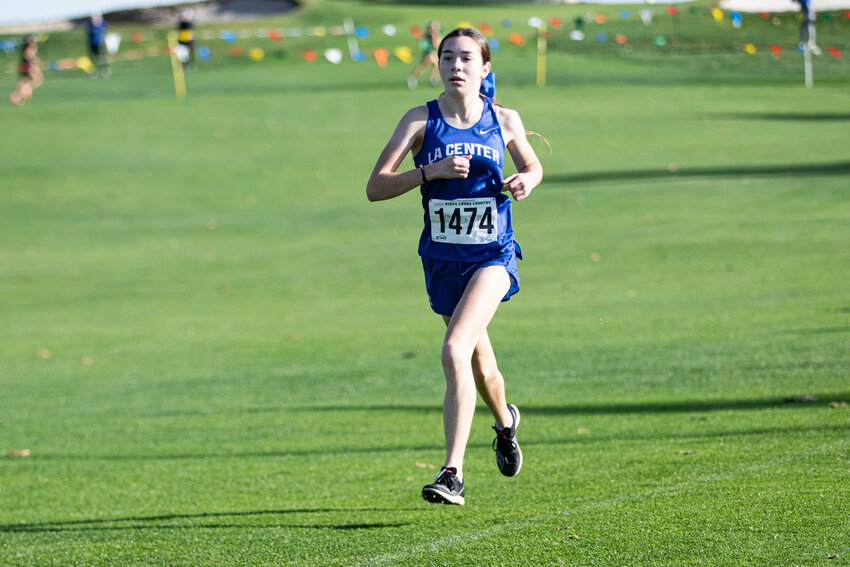 La Center's Sasha Pash competes during the Class 1A girls state cross country championships at Sun Willows Golf Course in Pasco on Saturday, Nov. 8.