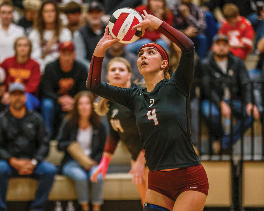 Prairie Falcons volleyball player Gracie Jacoby sets the ball during the Falcons&rsquo; three-set loss to the Camas Papermakers in October.