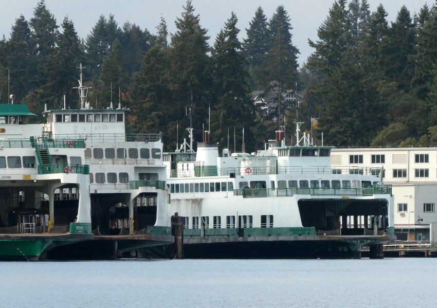 The state ferries Klahowya (center right) and Hyak (left center) are taking up valuable space at the Eagle Harbor maintenance yard of Washington State Ferries. Both retired ferries have been for sale for more than four years.