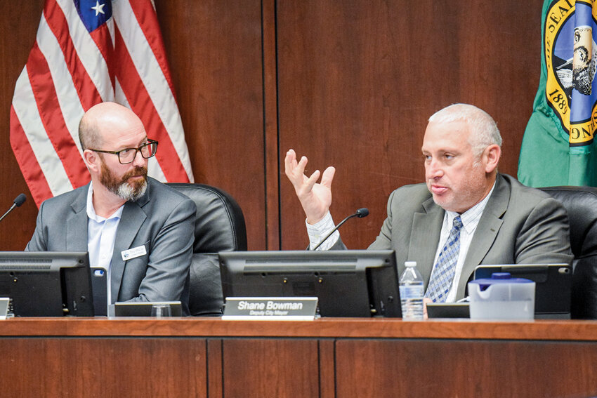 Mayor Troy McCoy and Councilmember Shane Bowman discuss the proposed public safety tax during the Nov. 17 Battle Ground City Council meeting. The council later voted unanimously to adopt the 0.1 percent sales tax increase to support police staffing.