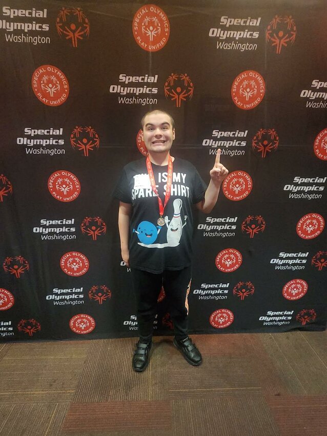 Battle Ground Special Olympics athlete Henry Troxel earned a first-place medal for his performance at the state bowling tournament on Sunday, Nov. 9 at All Star Lanes and Casino in Silverdale.