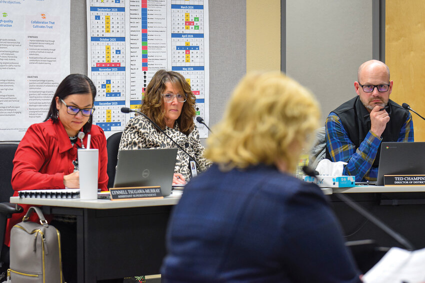 Superintendent Shelly Whitten and the Battle Ground Public Schools Board of Directors listen as Chief Financial Officer Michelle Scott presents a proposed levy on Monday, Nov. 24. The board voted unanimously to place a levy renewal on the Feb. 10 ballot.