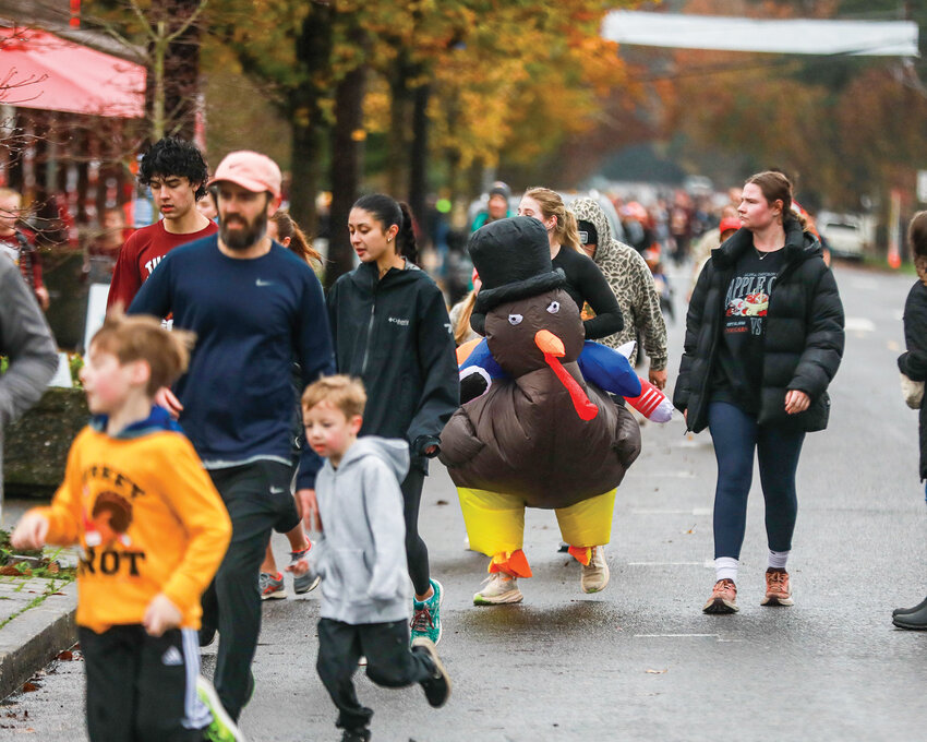 Turkey costumes filled the streets and trails of Ridgefield during the ninth annual Ridgefield Public Schools Foundation Turkey Trot on Thanksgiving morning.