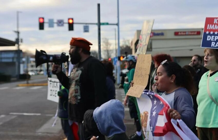 Protesters gather outside the Longview Police Department on Monday, Dec. 1.