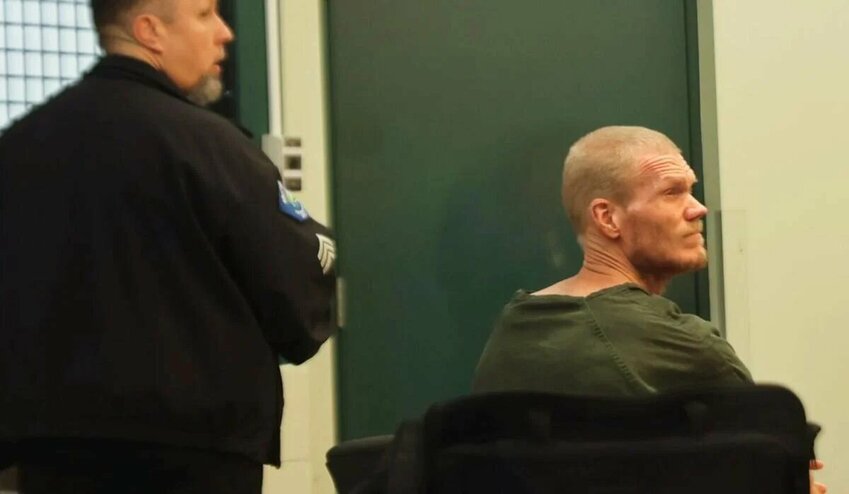 Alexander Lee Rogers, 51, of Longview, sits during his arraignment hearing at the Cowlitz County Jail courtroom on Tuesday, Sept. 9, in Kelso. He is looking toward the court spectators. Rogers pleaded guilty and was sentenced on Thursday.