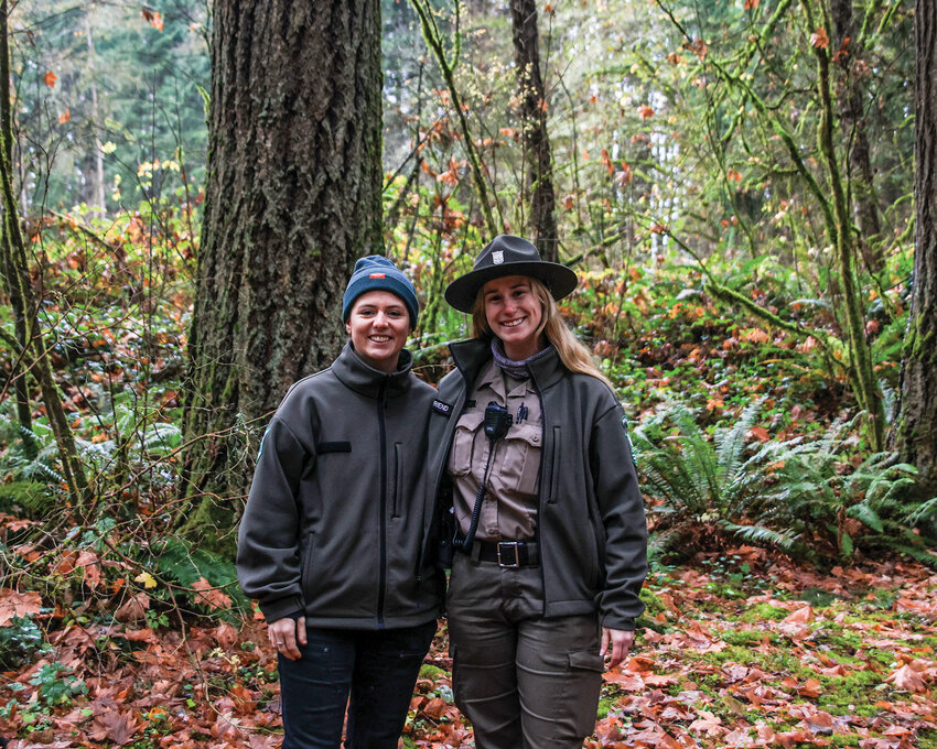 Battle Ground Lake State Park Ranger Breanna Friend, right, and Faith Snow, an intern through the Washington state Parks Department of Defense Skillbridge internship program, are both looking forward to the First Day Hikes coming up on the First of the Year at the park.