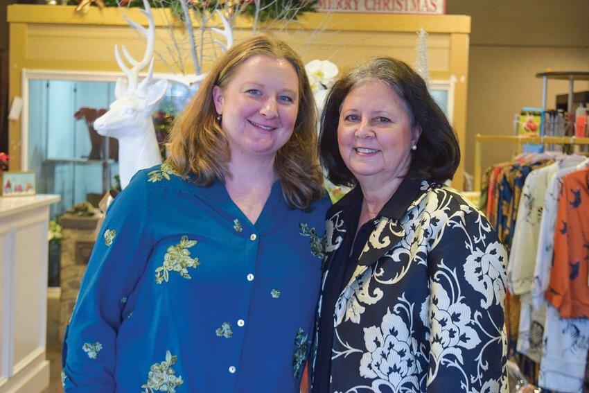 Kerry Rylander (right) and Katie Burbank stand inside the new Ridgefield Floral and Gifts location on Main Avenue in early December. The shop moved into the former Ridgefield Hardware space in November. The space hosts local vendors and nonprofits, including the Ridgefield Arts Association&rsquo;s gallery in Janruary.