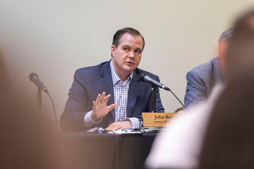 Sen. John Braun speaks during a legislative forum.