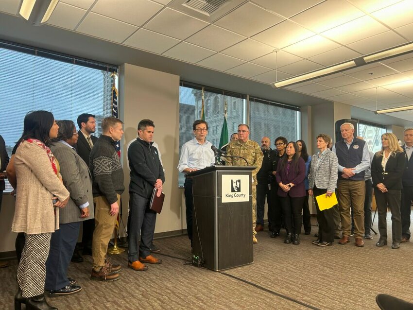 Washington Gov. Bob Ferguson speaks to the media at a press conference on flooding alongside state and local officials in Seattle on Tuesday, Dec. 16, 2025. (Photo by Jake Goldstein-Street/Washington State Standard)