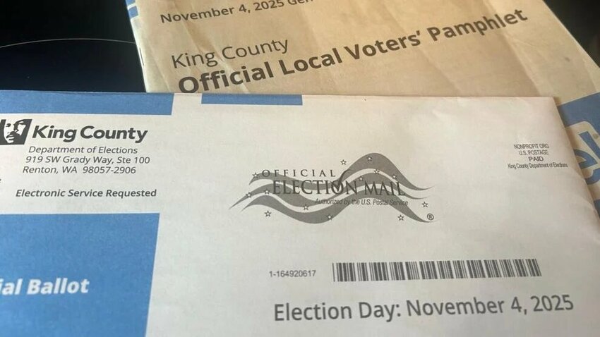 A Washington state ballot and voters pamphlet for the Nov. 4, 2025, election are shown, Oct. 30, 2025. Photo: Carleen Johnson / The Center Square