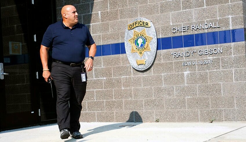Then-Kalama Police Chief Ralph Herrera walks outside the Kalama Police Department in 2021 during a training.