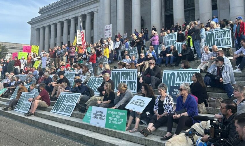 April 15, 2025 anti tax rally on steps on capitol in Olympia, WA.