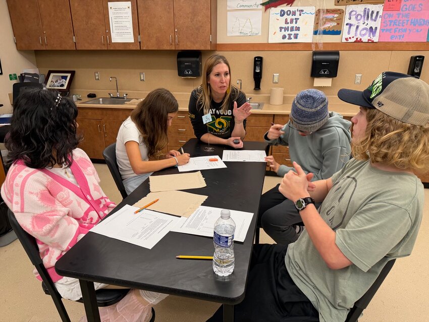 In Valerie Buck&rsquo;s class at Maywood Middle School, reading and writing skills are woven into lessons on other topics. There&rsquo;s also an emphasis on hands-on learning in the class, part of Issaquah School District&rsquo;s experimental microschool. (Photo by Donna Gordon Blankinship)