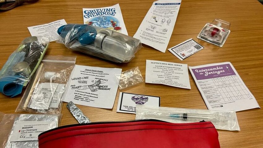 A harm reduction kit provided by Public Health &ndash; Seattle &amp; King County includes clean syringes, drug preparation supplies, medicated wipes, and informational materials distributed to people who use drugs.