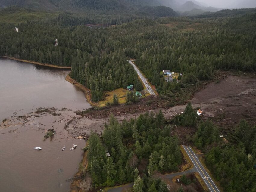 The deadly landslide that crashed through the outskirts of Wrangell on the night of Nov. 20, 2023, is seen from the air on the following day. The landslide killed six people and blocked a major road, the Zimovia Highway. The slide was triggered by heavy rain carried north by an atmospheric river.