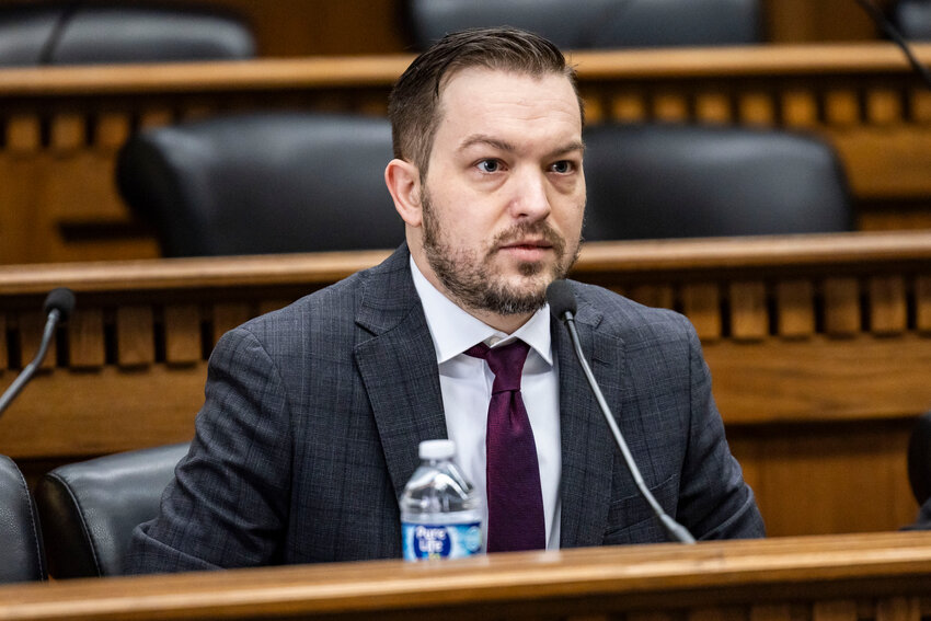 Rep. Travis Couture speaks on a general fund budget panel during a legislative session preview in Olympia on Friday, Jan. 9.