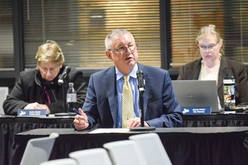Finance Director Kirk Johnson presents a letter of intent outlining a public-private partnership with Blue Rock Ventures, which will co-develop and privately construct the recreation center portion of the Ridgefield Community and Recreation Center project, during a Ridgefield City Council meeting on Thursday, Jan. 8.