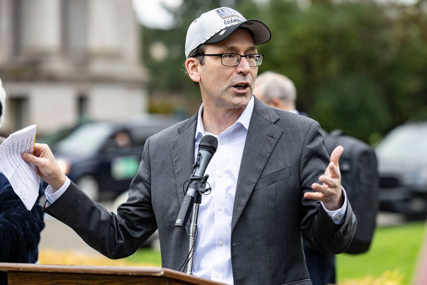 Gov. Bob Ferguson speaks during a &ldquo;12&rdquo; flag raising ceremony at the state Capitol in Olympia on Wednesday, Jan. 14.