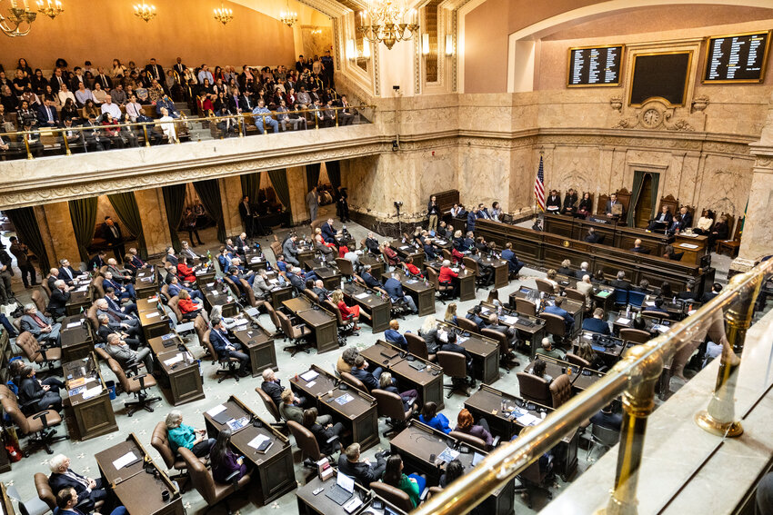 Gov. Bob Ferguson delivers the State of the State address in the House chamber in Olympia on Tuesday, Jan. 13.