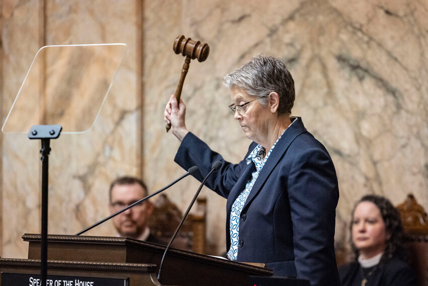 House Speaker Laurie Jinkins raises the gavel on the second day of the Washington state Legislative session in Olympia on Tuesday, Jan. 13.