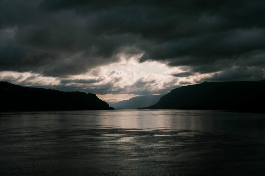 The sun breaks through a stretch of clouds along the Columbia River, in Hood River County, Oregon, on Thursday, July 25, 2024.