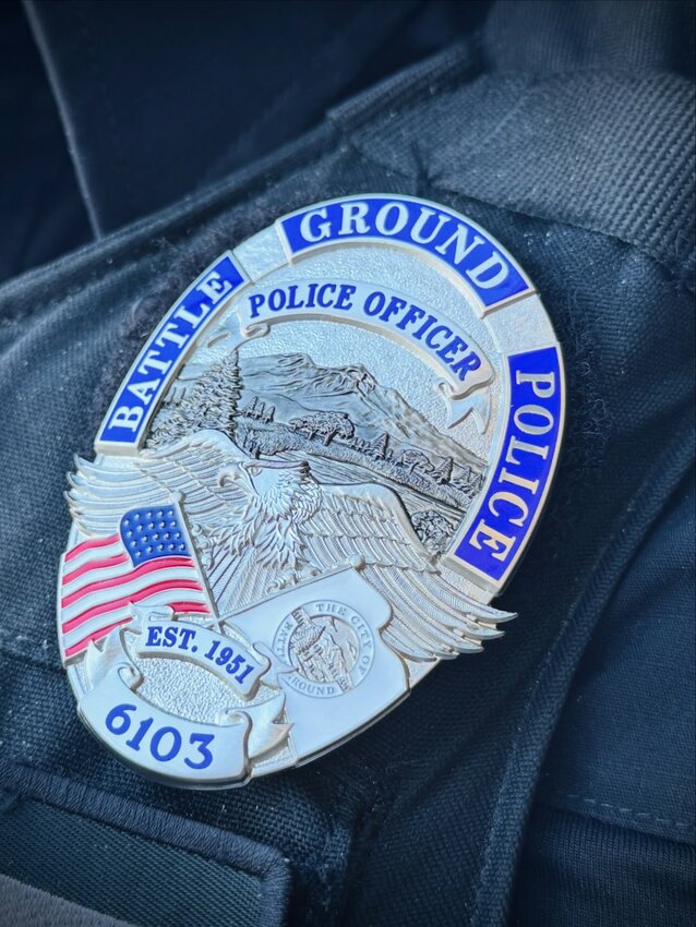 The Battle Ground Police Department&rsquo;s redesigned badge features silver imagery of local landmarks, including Mount St. Helens and Battle Ground Lake.