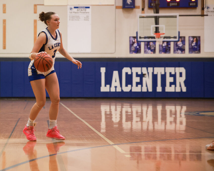 La Center junior guard Paige Sherry looks to make a pass during the Wildcats&rsquo; 36-23 loss to Columbia High School on Thursday, Jan. 22.