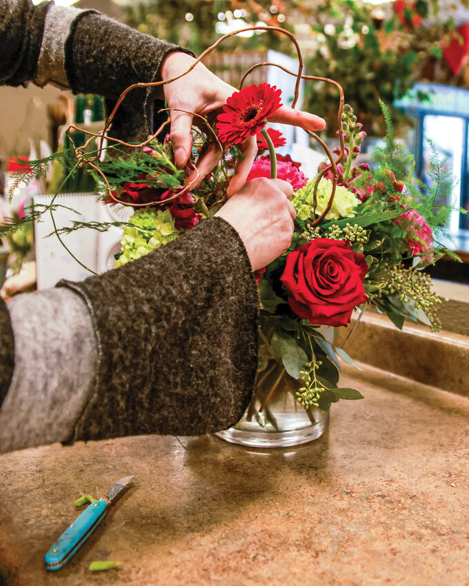 Main Street Floral Company in Battle Ground started the Valentine&rsquo;s Day madness as early as November, and the creation of bouquets was well underway on Wednesday, Jan. 28.