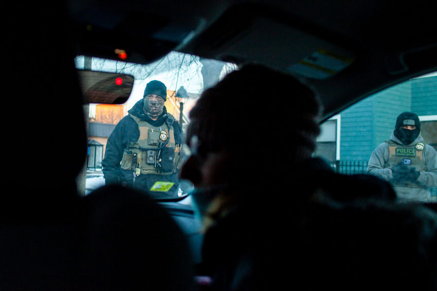 Three cars filled with federal agents stop in front of Elle Neubauer and another observer, surrounding the car and threatening arrest during an early morning watch observing ICE in South Minneapolis Monday, Jan. 12, 2026. (Photo by Nicole Neri/Minnesota Reformer)