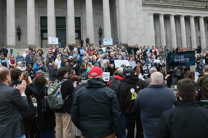 Supporters of Let&rsquo;s Go Washington initiatives intended to bolster parental rights and block transgender athletes from girls&rsquo; sports, gather on the north steps of the Washington state Capitol on Tuesday, Feb. 3, 2026. (Photo by Aspen Ford/Washington State Standard)