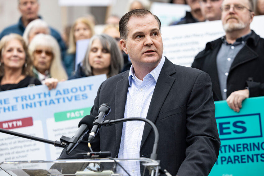 State Sen. John Braun, R-Centralia, speaks at a Let&rsquo;s Go Washington rally supporting initiatives concerning parental rights and barring transgender athletes from participating in girls&rsquo; athletics at the Washington state Capitol on Tuesday, Feb. 3.