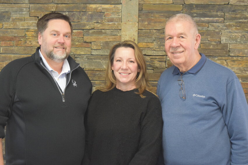 Kiwanis Club of Ridgefield/La Center President Jason Hair, left, club secretary Theresa Gagne-Hair and volunteer Mike Kirkman stand together at La Center Church, where the club hosts its regular meetings. The group spent its first year building partnerships and supporting youth-focused efforts across Ridgefield and La Center.