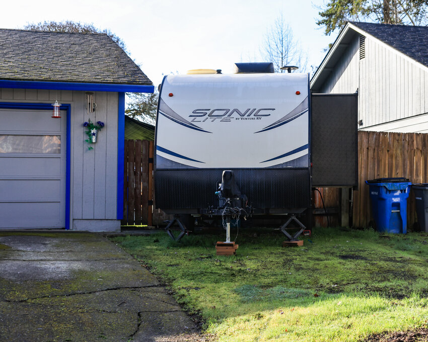 A trailer in violation of current Battle Ground Municipal Code 17.135.150 is parked in a yard in front of the building line on Friday, Feb. 6. On Monday, Feb. 2, the Battle Ground City Council provided direction for city staff to draft new code language.