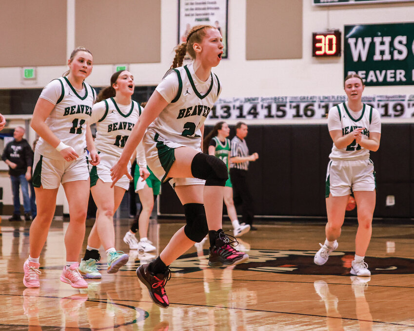 Woodland sophomore guard Makynzie Guthrie celebrates a three-point shot in the Beavers&rsquo; 58-47 win over Tumwater High School on Friday, Feb. 13.