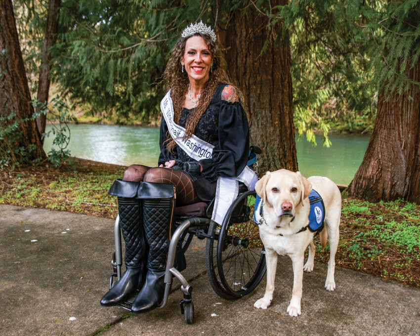 Clark County resident DeLena Perry was crowned Miss Wheelchair Washington in January. Perry is accompanied by her service dog Nico during a visit to one of her favorite places, Lewisville Park, on Thursday, Feb. 12.