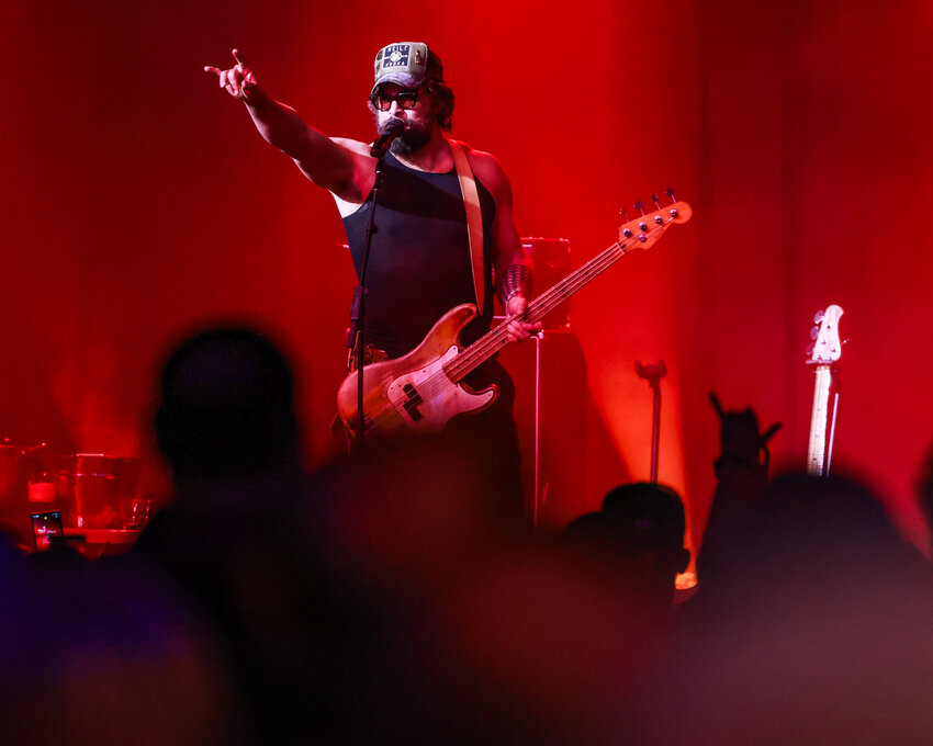 Actor and film producer Jason Momoa interacts with the massive crowd while playing bass guitar for his band, &Ouml;OF TATAT&Aacute;, at Rock and Brews in the ilani Casino and Resort on Monday, Feb. 9